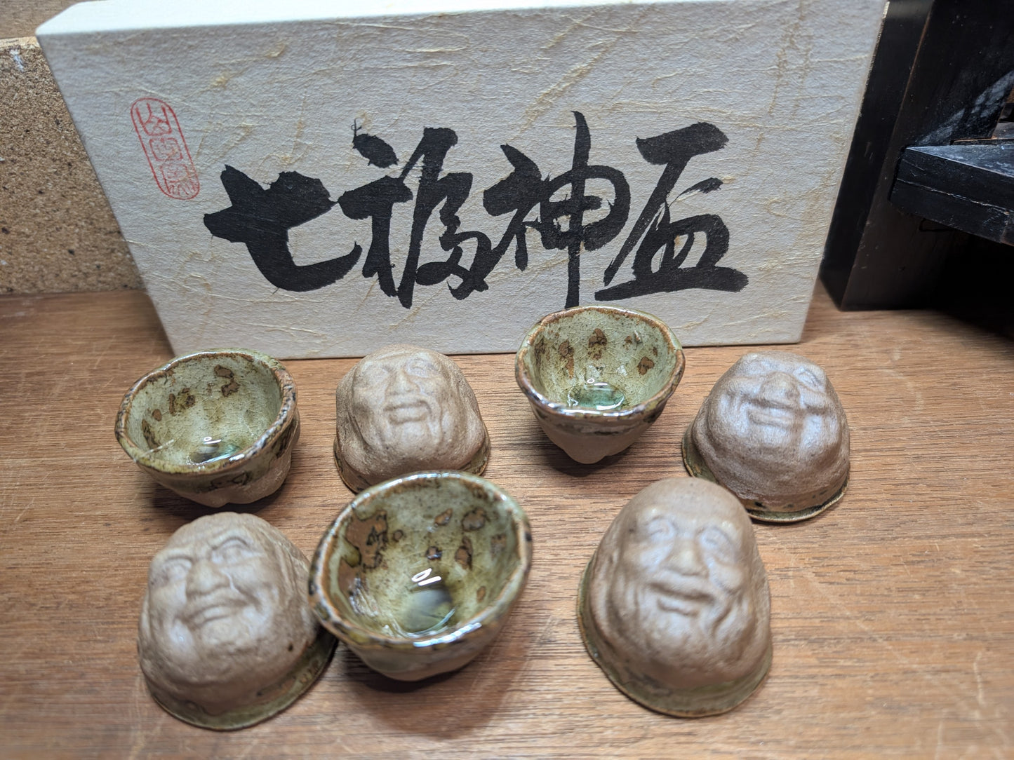 Japanese Unique sake cups set seven lucky gods faces Ceramic pottery cups made in Japan w/ original box (A124)