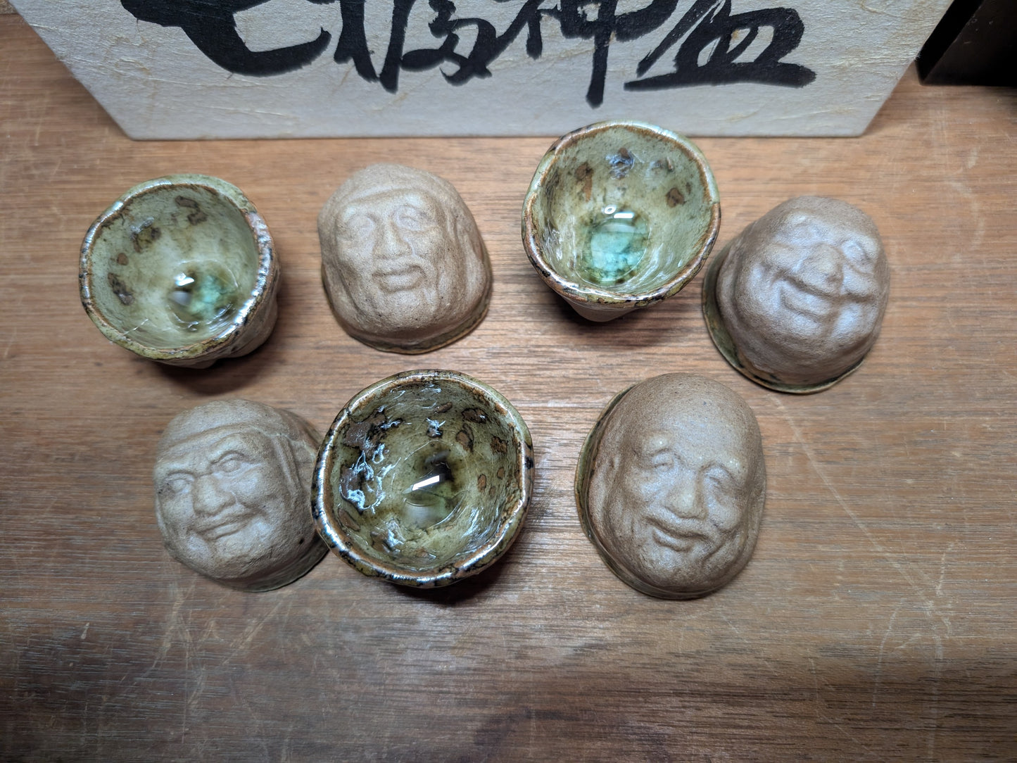 Japanese Unique sake cups set seven lucky gods faces Ceramic pottery cups made in Japan w/ original box (A124)