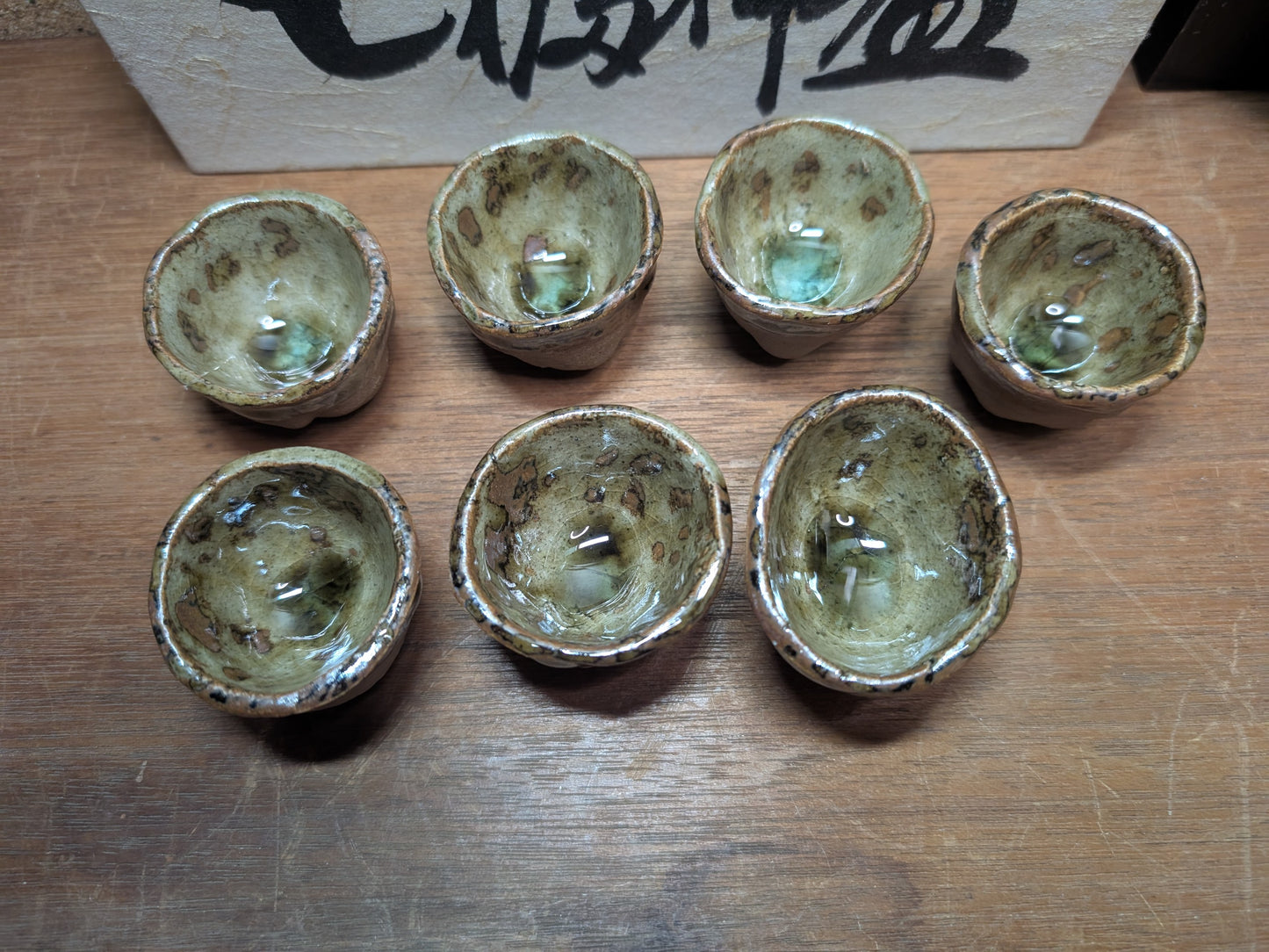 Japanese Unique sake cups set seven lucky gods faces Ceramic pottery cups made in Japan w/ original box (A124)